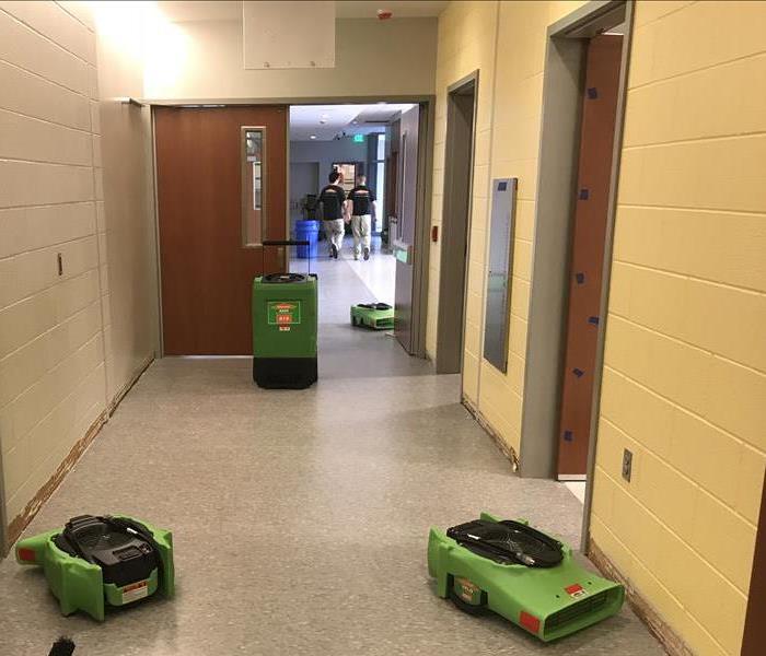 SERVPRO equipment placed in a hallway